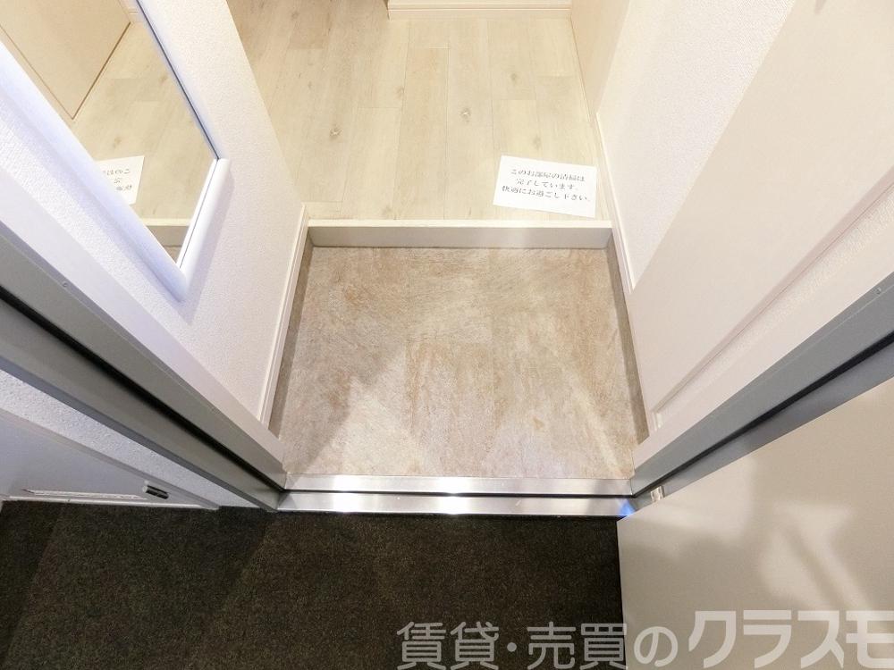 18/30 玄関