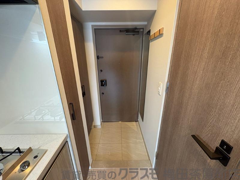 16/30 玄関