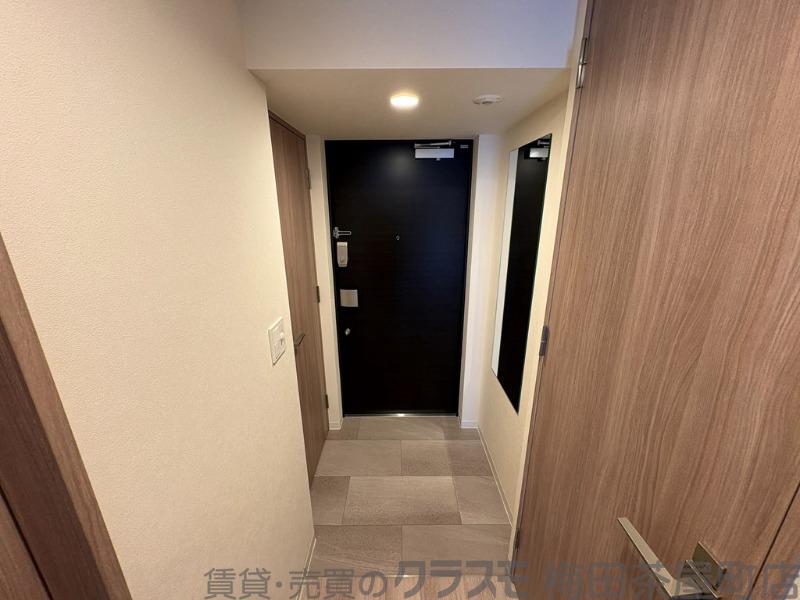 16/30 玄関